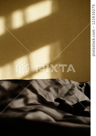 Bed 2 in a room with warm light at dusk Bed 2 in a room with warm light at dusk 121616278