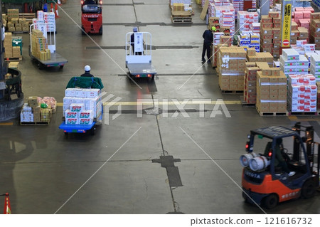 Ota Market at the end of the year: piles of cardboard boxes containing fruits and vegetables Ota Market at the end of the year: piles of cardboard boxes containing fruits and vegetables 121616732