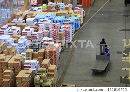 Ota Market at the end of the year: piles of cardboard boxes containing fruits and vegetables 121616733