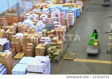 Ota Market at the end of the year: piles of cardboard boxes containing fruits and vegetables Ota Market at the end of the year: piles of cardboard boxes containing fruits and vegetables 121616735