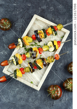 Grilled skewers vegetables on plate. 121617098