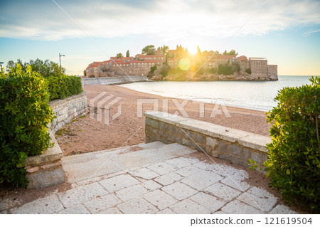 Sveti Stefan island near Budva at sunset light in winter time. Closed resort in Montenegro Sveti Stefan island near Budva at sunset light in winter time. Closed resort in Montenegro 121619504