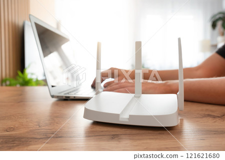 Fast internet concept with modern WiFi router 121621680