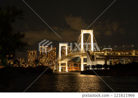 The illuminated Rainbow Bridge shining in the night sky The illuminated Rainbow Bridge shining in the night sky 121621966