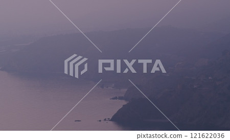 Nght is falling over sea cliff coast. 121622036