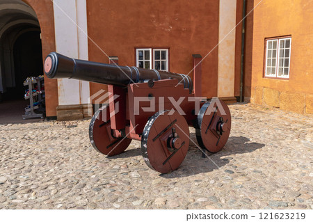 Old cannon. Antique weapons for military operations and defense Old cannon. Antique weapons for military operations and defense 121623219