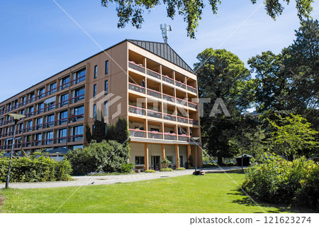 Residential building. Multi-storey building with an antenna on the roof. 121623274