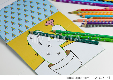 Faber-Castell colored pencils for drawing various colors and coloring book for children. Faber-Castell colored pencils for drawing various colors and coloring book for children. 121623471