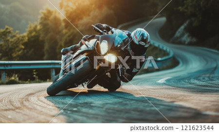Motorcycle rider leaning into a curve, Man on a motorbike at high speed leaning in the curve, Racing sport 121623544
