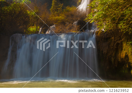 Thi Lo Su Waterfall is the largest waterfall in Tak Province, Thailand. It is located on a limestone mountain with many levels. It is located in Umphang Wildlife Sanctuary, which borders Myanmar. 121623952