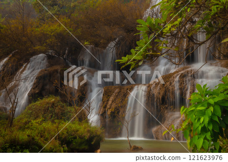 Thi Lo Su Waterfall is the largest waterfall in Tak Province, Thailand. It is located on a limestone mountain with many levels. It is located in Umphang Wildlife Sanctuary, which borders Myanmar Thi Lo Su Waterfall is the largest waterfall in Tak Province, Thailand. It is located on a limestone mountain with many levels. It is located in Umphang Wildlife Sanctuary, which borders Myanmar 121623976