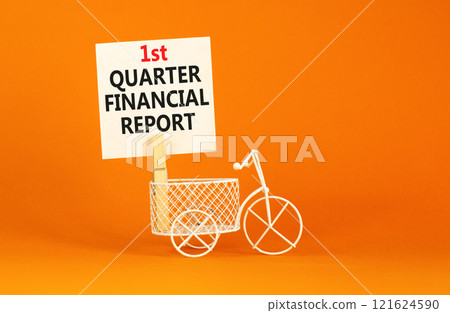 1st quarter financial report symbol. Concept words 1st quarter financial report on beautiful white paper. Beautiful orange background. Business 1st quarter financial report concept. Copy space. 121624590