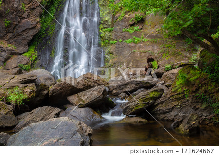 Klong Lan Waterfall is one of the most beautiful and grand waterfalls in Thailand. Below it is a large pool where you can swim. It is located in Khlong Lan Waterfall National Park, Kamphaeng Phet Klong Lan Waterfall is one of the most beautiful and grand waterfalls in Thailand. Below it is a large pool where you can swim. It is located in Khlong Lan Waterfall National Park, Kamphaeng Phet 121624667