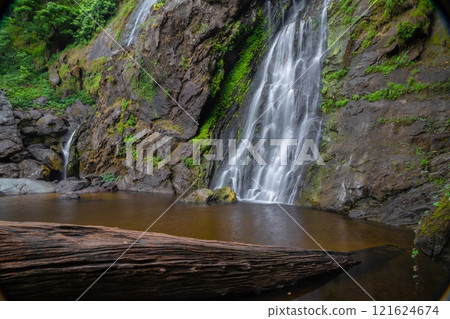 Klong Lan Waterfall is one of the most beautiful and grand waterfalls in Thailand. Below it is a large pool where you can swim. It is located in Khlong Lan Waterfall National Park, Kamphaeng Phet 121624674