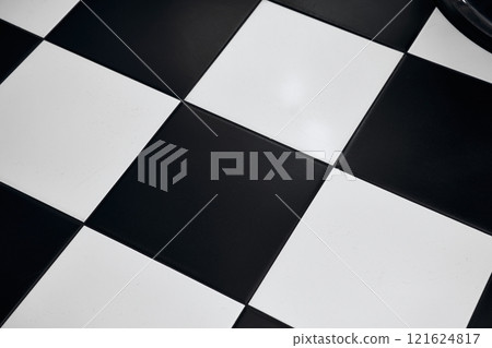 Stylish black and white tiled floor design in a modern interior space Stylish black and white tiled floor design in a modern interior space 121624817