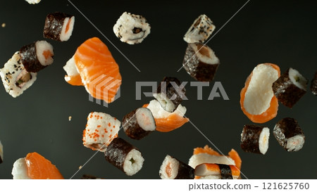 Freeze Motion Shot of Fresh Sushi Flying in the Air , Close-up 121625760