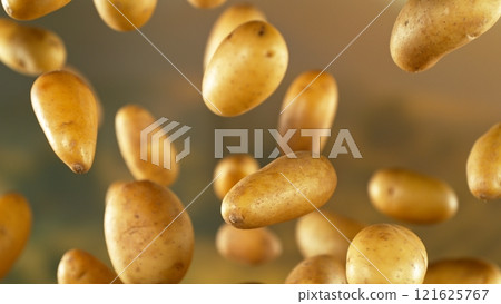 Freeze motion of flying early potatoes , Close-up 121625767