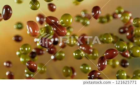 Freeze motion of flying fresh green and black olives , close-up Freeze motion of flying fresh green and black olives , close-up 121625771