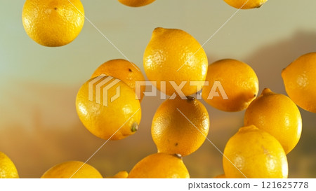 Freeze motion shot of flying fresh Lemons , close-up Freeze motion shot of flying fresh Lemons , close-up 121625778