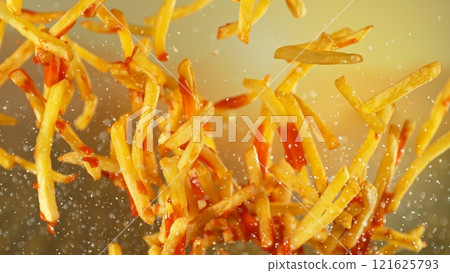 Freeze motion of flying french fries on gradient background 121625793