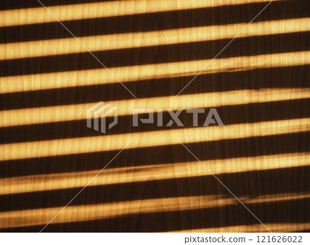 blinds shadow on wooden wall background 121626022