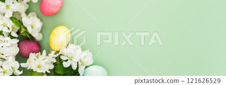 Easter eggs and blooming apple tree branches Easter eggs and blooming apple tree branches 121626529