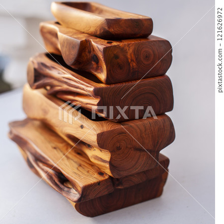 Wooden kitchen utensils stacked view Wooden kitchen utensils stacked view 121626972