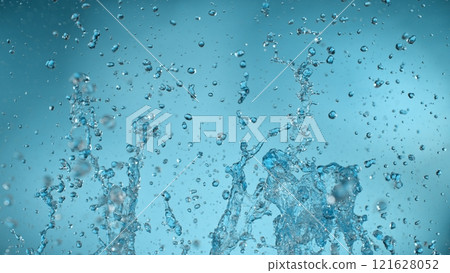Freeze motion of splashing water on light blue background 121628052
