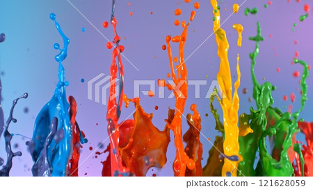 Freeze motion shot of dancing colors shapes isolated on gradient background 121628059