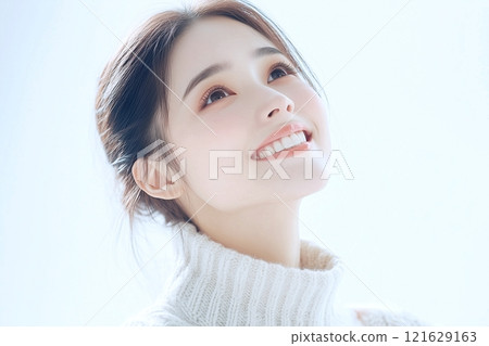 Beautiful woman looking up at the sky "AI generated image" Beautiful woman looking up at the sky "AI generated image" 121629163