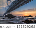 Bridge over the sea at sunrise 121629268