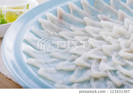 Delicious looking puffer fish sashimi platter 121631367