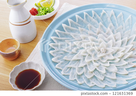 Delicious looking puffer fish sashimi platter 121631369