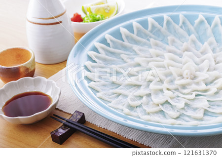 Delicious looking puffer fish sashimi platter 121631370