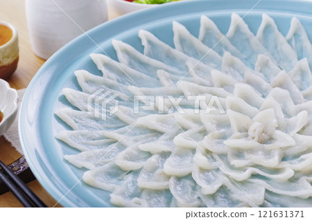 Delicious looking puffer fish sashimi platter 121631371