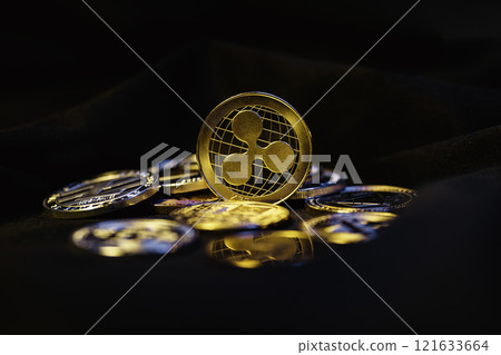 Ripple coin on black background. Currency appreciation.  121633664