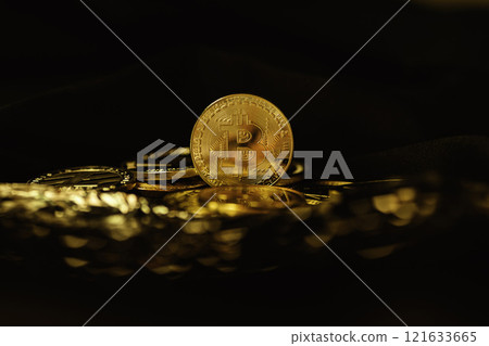 Bitcoin coins on a black background. Currency of the future. The world crisis Bitcoin coins on a black background. Currency of the future. The world crisis 121633665