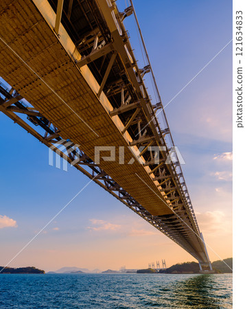 The Great Seto Bridge seen from directly below in the evening at Tatsunoura Park in Okayama Prefecture 121634833