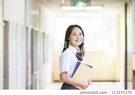 Portrait of a high school girl looking at the camera Portrait of a high school girl looking at the camera 121635170
