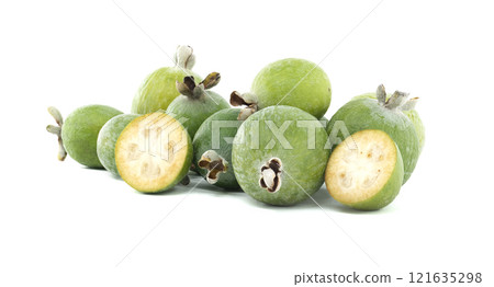 Fresh Green Feijoa Fruit Pile with Halved Juicy Slices Displayed Fresh Green Feijoa Fruit Pile with Halved Juicy Slices Displayed 121635298