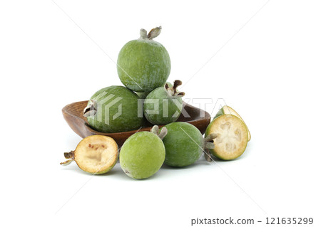 Fresh Green Feijoas in Wooden Bowl on White Background Fresh Green Feijoas in Wooden Bowl on White Background 121635299