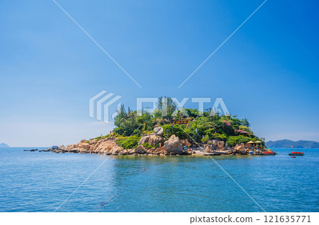 View of the Tu Ton Pagoda Island in Nha Trang. Buddhist temple on an island in the middle of the sea in Asia. View of the Tu Ton Pagoda Island in Nha Trang. Buddhist temple on an island in the middle of the sea in Asia. 121635771