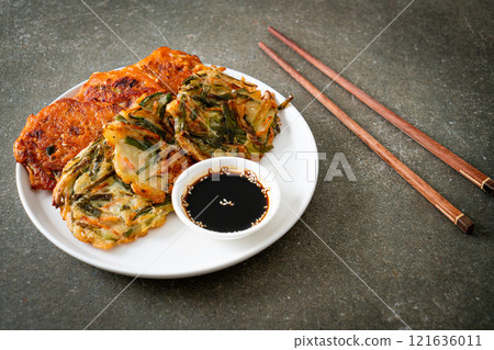 Pajeon or Korean pancake and Korean Kimchi pancake or Kimchijeon on white background 121636011