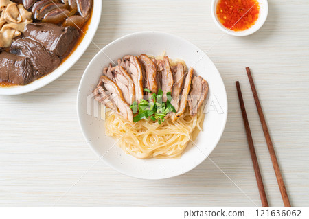 dried noodles with stewed duck in white bowl dried noodles with stewed duck in white bowl 121636062