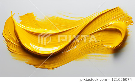 A vivid and textured yellow paint stroke on a smooth background, showcasing a glossy finish and bold curves. Perfect for art, design projects, or advertisements highlighting energy and creativity 121636074