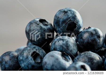 Blueberries close-up and dark background 121636689