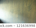 Light coming in from the left onto a wooden wall 121636998