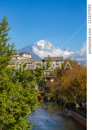 Jade Dragon Snow Mountain, Lijiang,Yunnan China. Take Photo from world heritage old town. 121637895