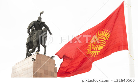 statue of manas and Kyrgyzstani flag in Ala-Too Square. The Epic of Manas is a lengthy and traditional epic poem of the Kyrgyz people of East and Central Asia statue of manas and Kyrgyzstani flag in Ala-Too Square. The Epic of Manas is a lengthy and traditional epic poem of the Kyrgyz people of East and Central Asia 121640506
