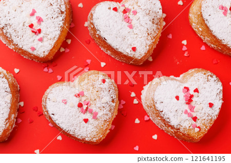 Delightful homemade heart-shaped cookies, perfectly crafted for Valentines Day Delightful homemade heart-shaped cookies, perfectly crafted for Valentines Day 121641195